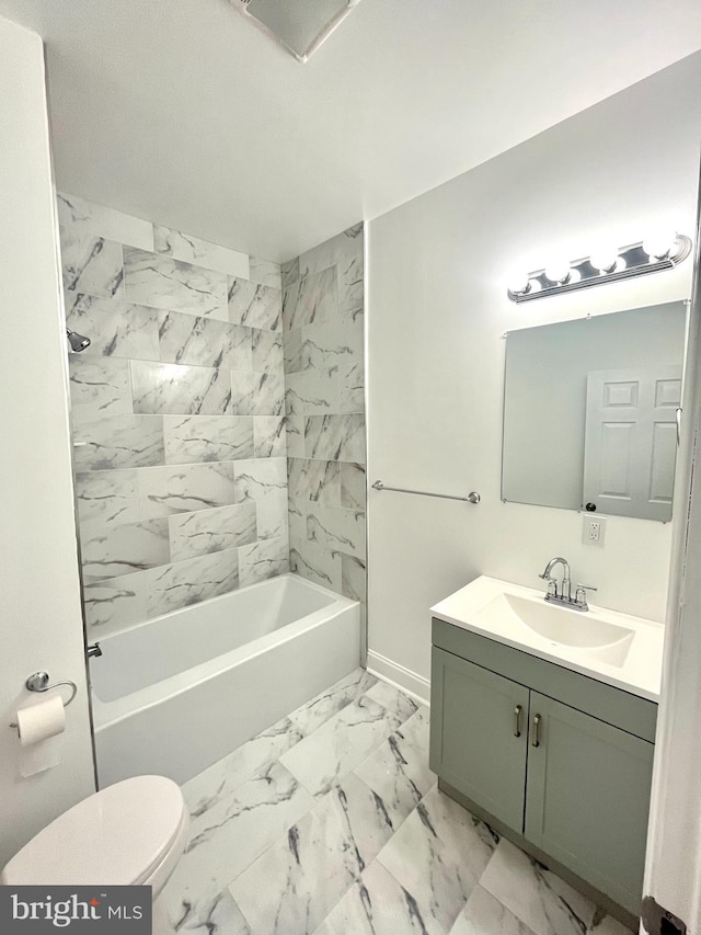 full bathroom with bathtub / shower combination, vanity, and toilet