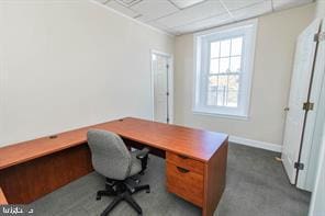 home office featuring a drop ceiling