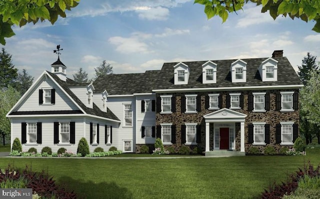 view of front of property with a front lawn