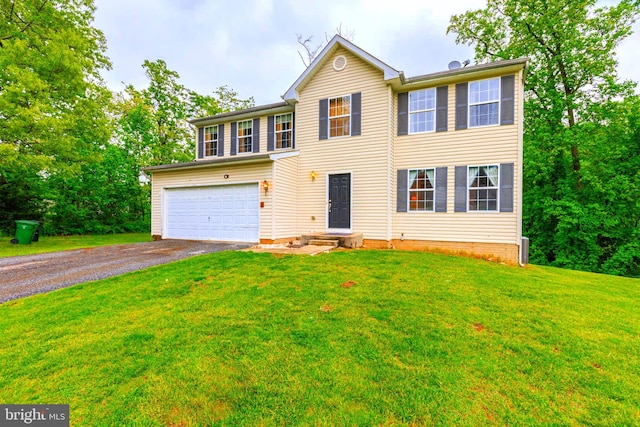 colonial home featuring a garage and a front yard