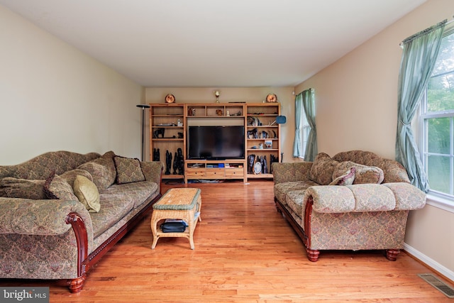 living room with hardwood / wood-style flooring