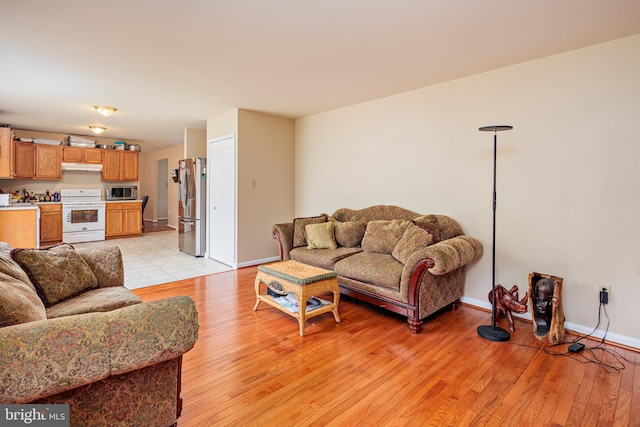 living room featuring light tile flooring