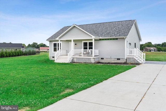 view of front of house featuring a front yard and a porch