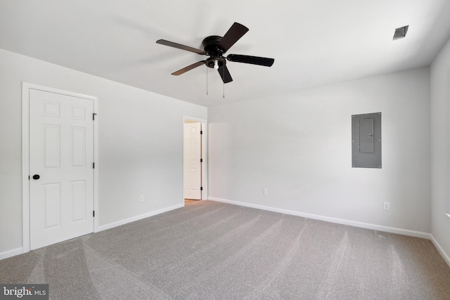 empty room featuring ceiling fan and carpet flooring