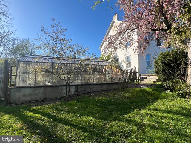 view of yard featuring a lanai