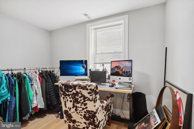 home office featuring light hardwood / wood-style floors