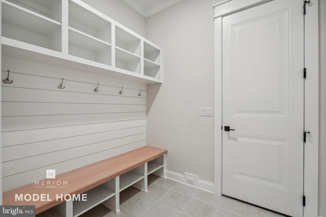 mudroom featuring light tile patterned flooring