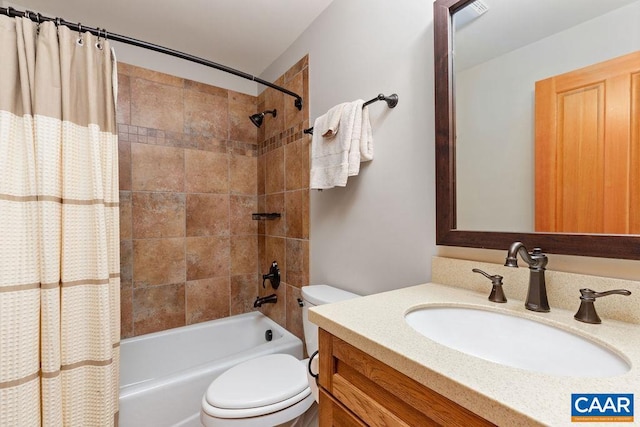 full bathroom with shower / tub combo, toilet, and vanity