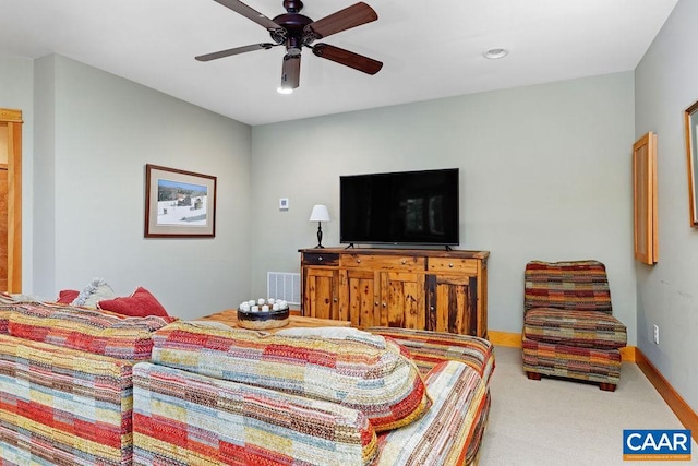 carpeted bedroom featuring ceiling fan