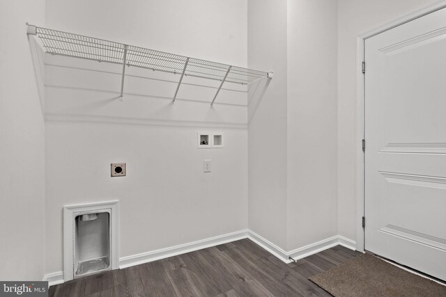 washroom with hookup for an electric dryer, dark wood-type flooring, and hookup for a washing machine