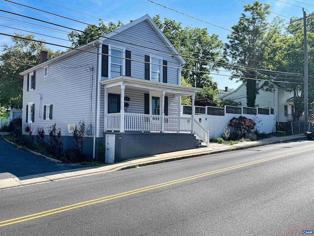 front facade featuring covered porch