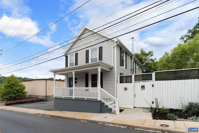 front facade featuring covered porch