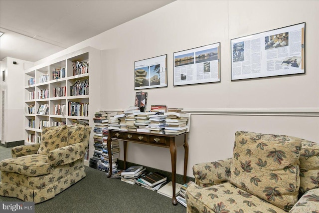 living area with carpet flooring