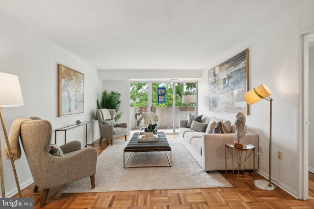 living room featuring parquet floors