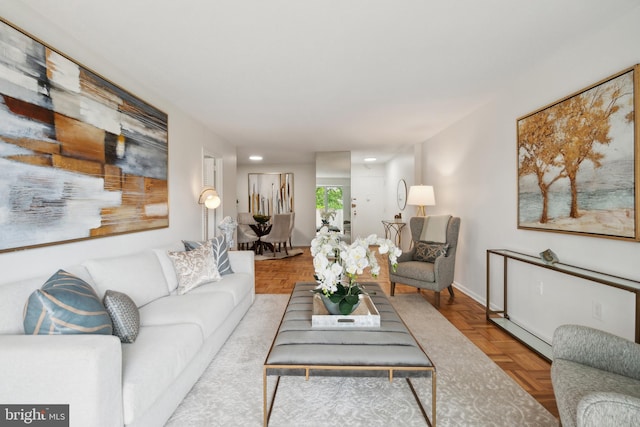 living room featuring parquet floors