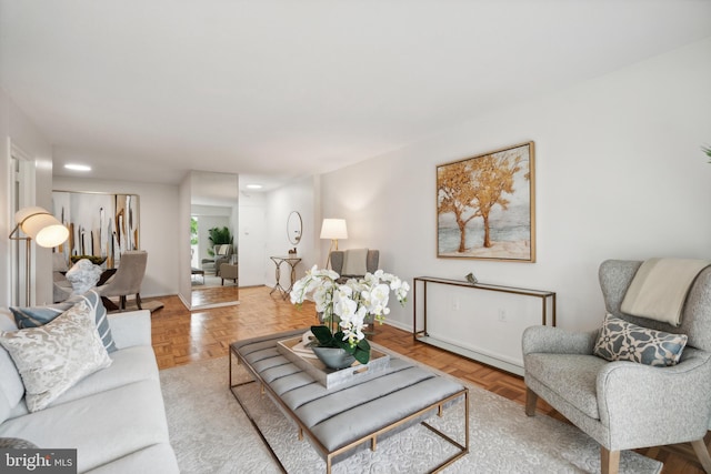 living room featuring parquet floors