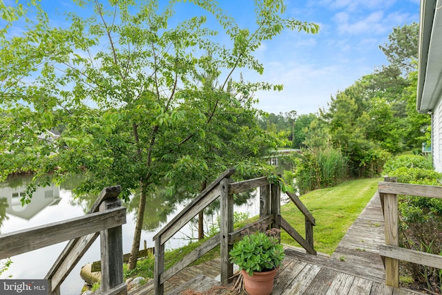 deck featuring a water view