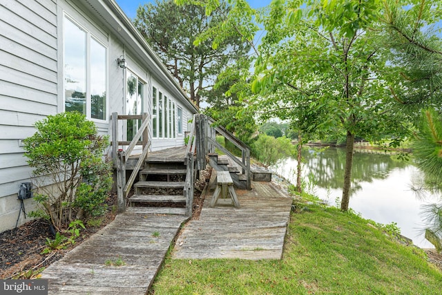 deck featuring a water view