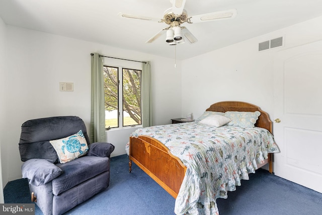 bedroom with ceiling fan and carpet flooring