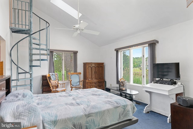 bedroom featuring carpet floors, multiple windows, a skylight, and ceiling fan