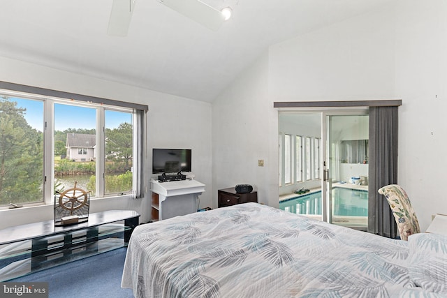 bedroom with carpet flooring, ceiling fan, and vaulted ceiling