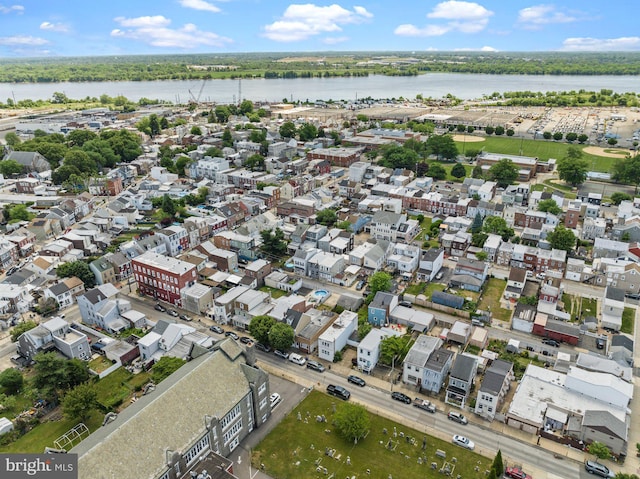 drone / aerial view with a water view