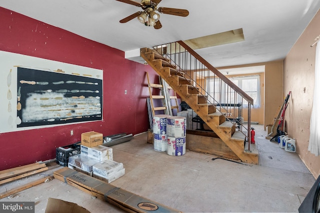 interior space featuring ceiling fan