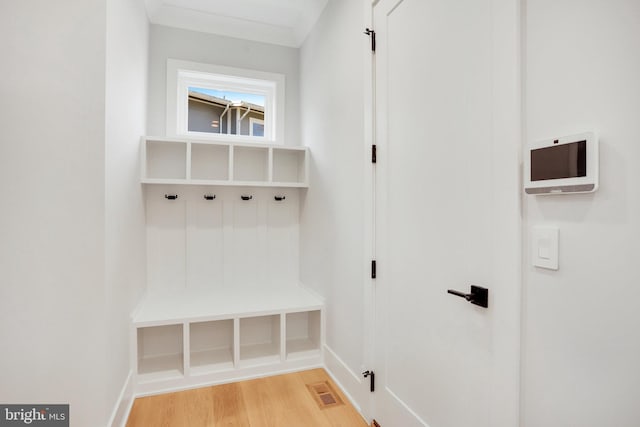 7013 Raleigh Rd, Annandale, VA 22003 - mudroom featuring light wood-style floors, visible vents, and baseboards