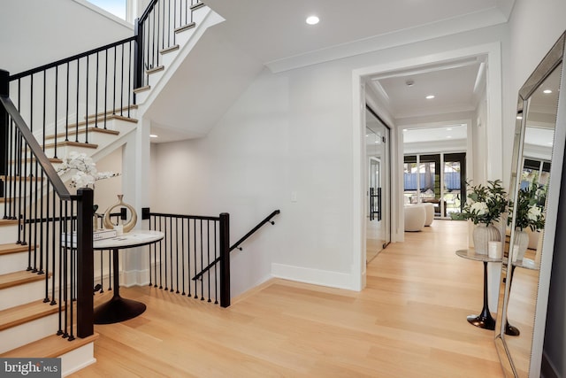 7013 Raleigh Rd, Annandale, VA 22003 - stairway featuring crown molding, wood finished floors, and recessed lighting
