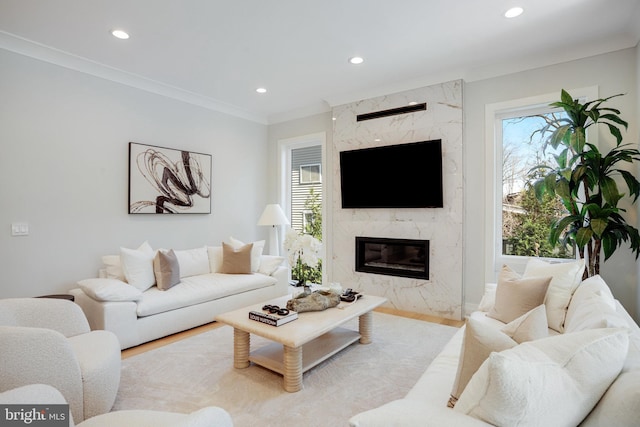 7013 Raleigh Rd, Annandale, VA 22003 - living area with recessed lighting, a high end fireplace, and a healthy amount of sunlight