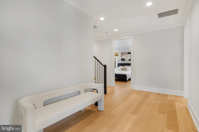 7013 Raleigh Rd, Annandale, VA 22003 - corridor with recessed lighting, visible vents, baseboards, light wood-style flooring, and stairs