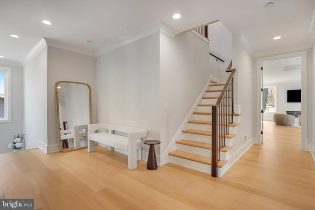 7013 Raleigh Rd, Annandale, VA 22003 - stairway with recessed lighting, wood finished floors, and crown molding