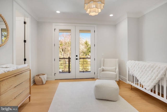 7013 Raleigh Rd, Annandale, VA 22003 - bedroom featuring french doors, wood finished floors, and multiple windows