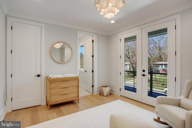 7013 Raleigh Rd, Annandale, VA 22003 - entryway featuring a chandelier, a wealth of natural light, french doors, and wood finished floors