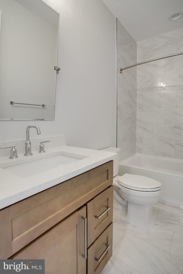 7013 Raleigh Rd, Annandale, VA 22003 - full bathroom with toilet, vanity, and shower / washtub combination