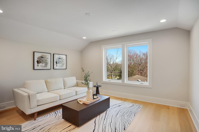7013 Raleigh Rd, Annandale, VA 22003 - living area featuring lofted ceiling, baseboards, recessed lighting, and light wood-type flooring