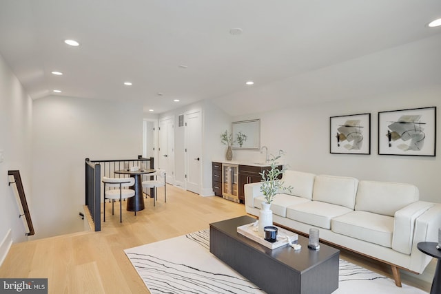 7013 Raleigh Rd, Annandale, VA 22003 - living area with recessed lighting, light wood finished floors, wine cooler, visible vents, and baseboards