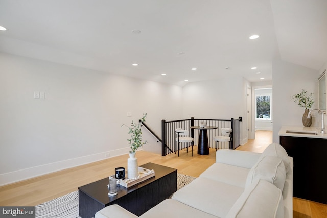 7013 Raleigh Rd, Annandale, VA 22003 - living area with light wood-style flooring, baseboards, and recessed lighting