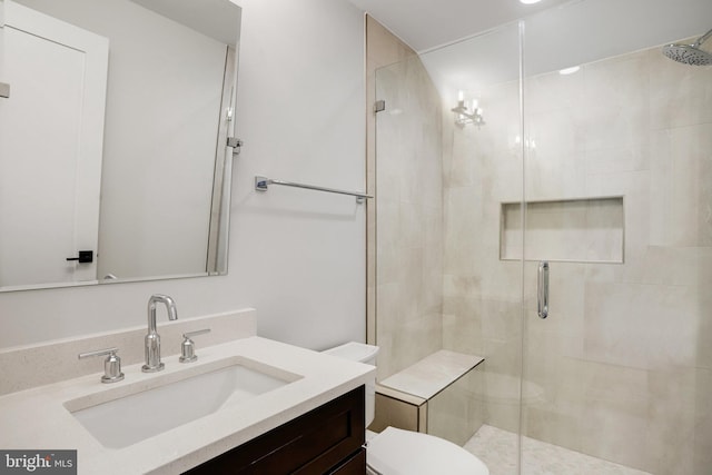 7013 Raleigh Rd, Annandale, VA 22003 - full bath featuring a shower stall, toilet, and vanity