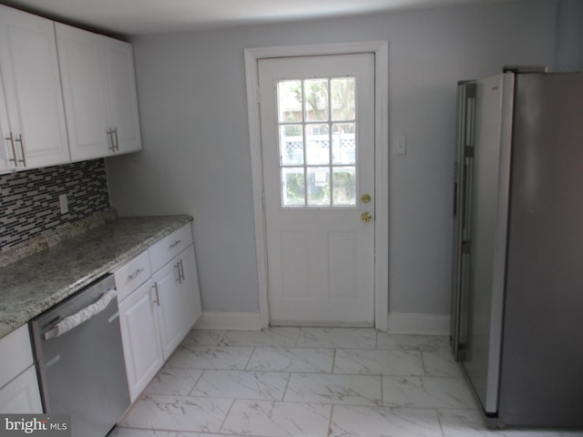 bathroom featuring plenty of natural light