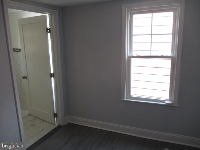 bathroom with separate shower and tub, toilet, and tile walls