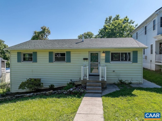 view of front of house with a front lawn