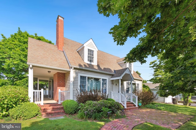 view of new england style home