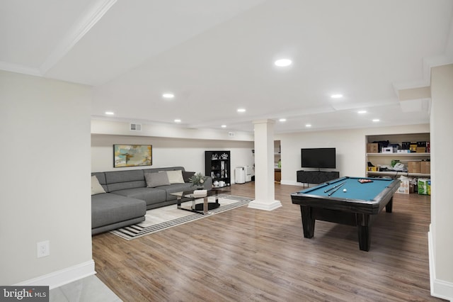 game room with hardwood / wood-style flooring, crown molding, and pool table