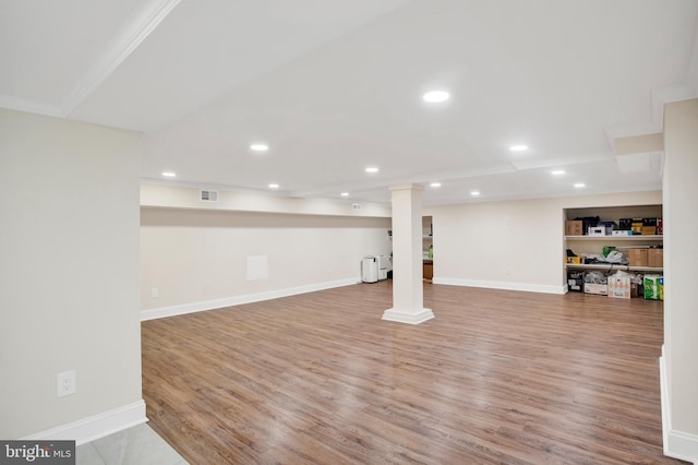 basement featuring hardwood / wood-style flooring