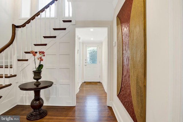 entrance foyer featuring dark hardwood / wood-style flooring