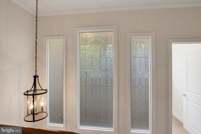 interior space with crown molding