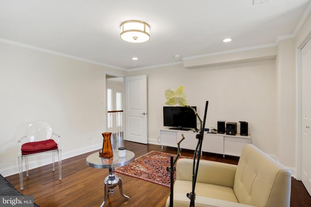 interior space with hardwood / wood-style floors and ornamental molding