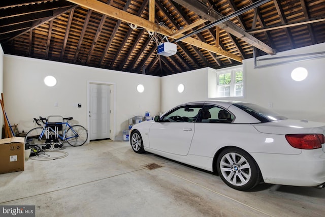 garage featuring a garage door opener