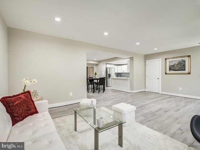 living room featuring light hardwood / wood-style floors